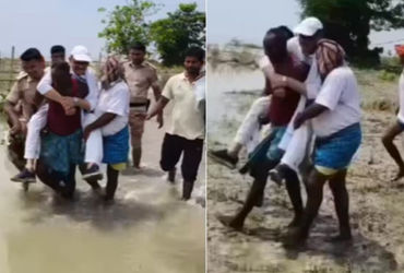 VIDEO: કાદવમાં Congress MP તારિક અનવર યુવકના ખભા પર સવાર થઈ પૂરનું નિરીક્ષણ કરવા પહોંચ્યા.