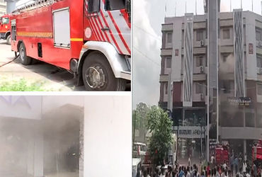 Fire erupts at Ahmedabad building; ten fire engines deployed - Vimarsana News