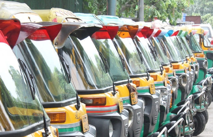 Ahmedabad rickshaw unions protest mandatory police registration allege unofficial charges up to rs 100