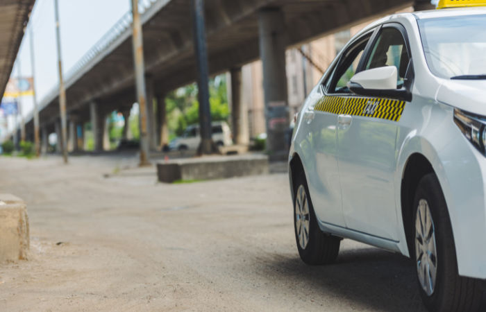 Taxi from airport catches fire near Shahibaug Circuit House, no casualties reported