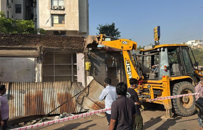 16 encroached shops demolished in Ahmedabad’s Ambawadi market after 17 years